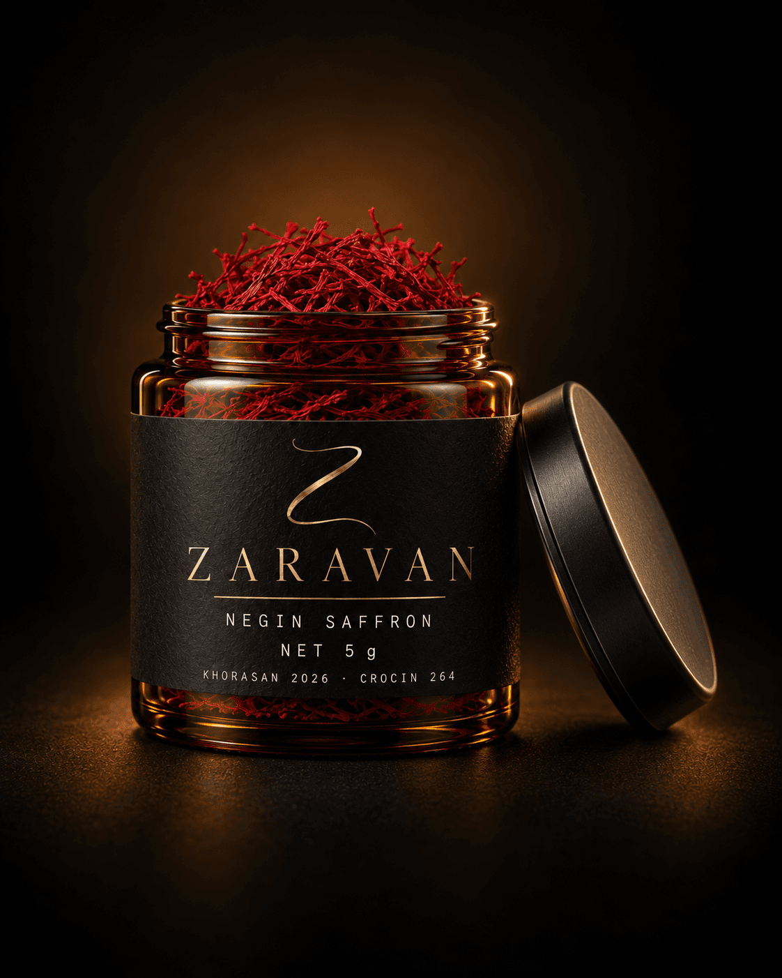 Open amber jar of Negin threads with a matte black lid resting against it.